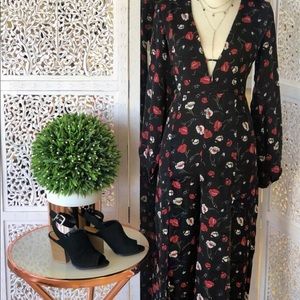 Long sleeve printed black and floral jumpsuit
